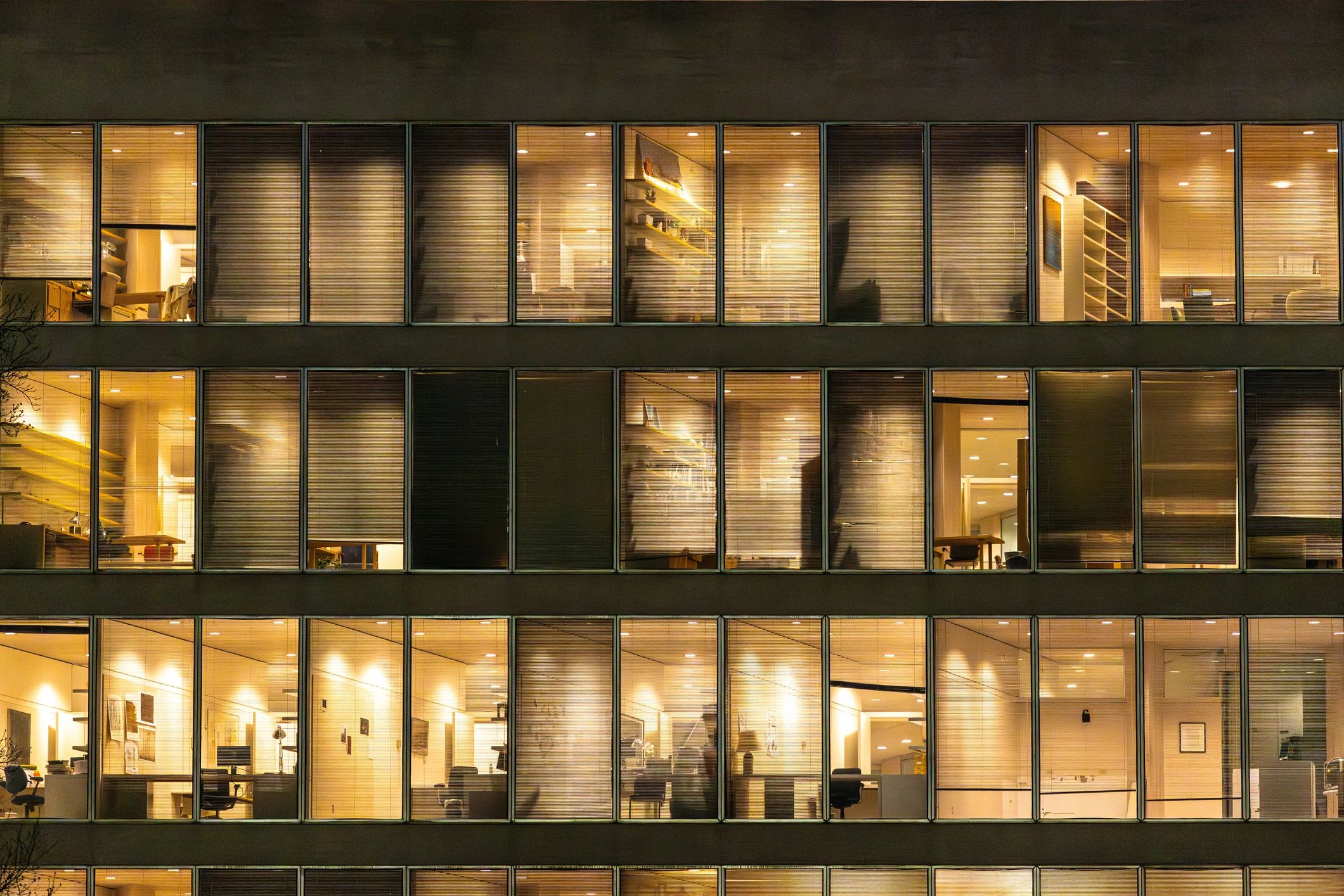 Illuminated office windows pattern at night