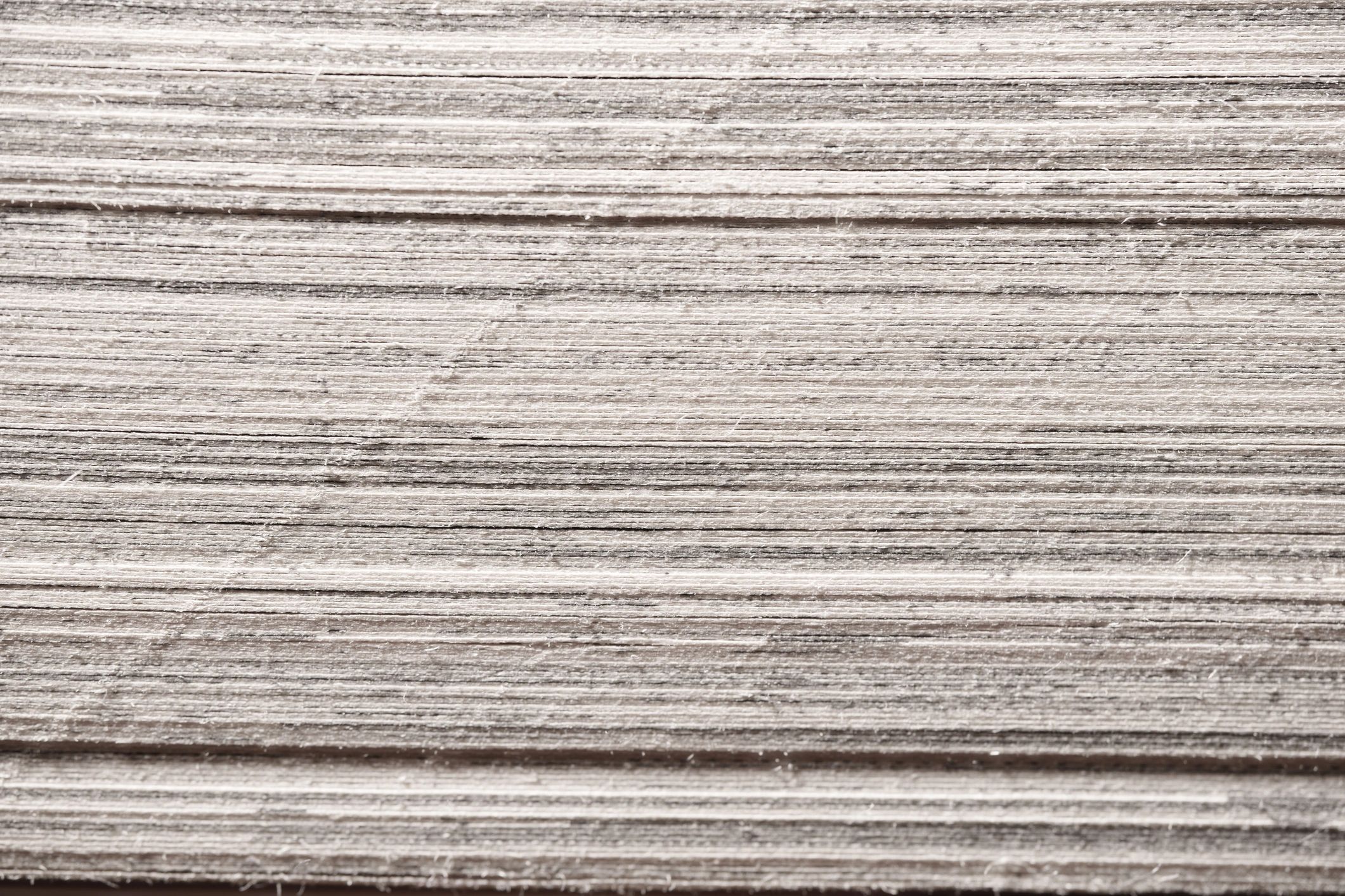 Close-up of stacked book pages from the side