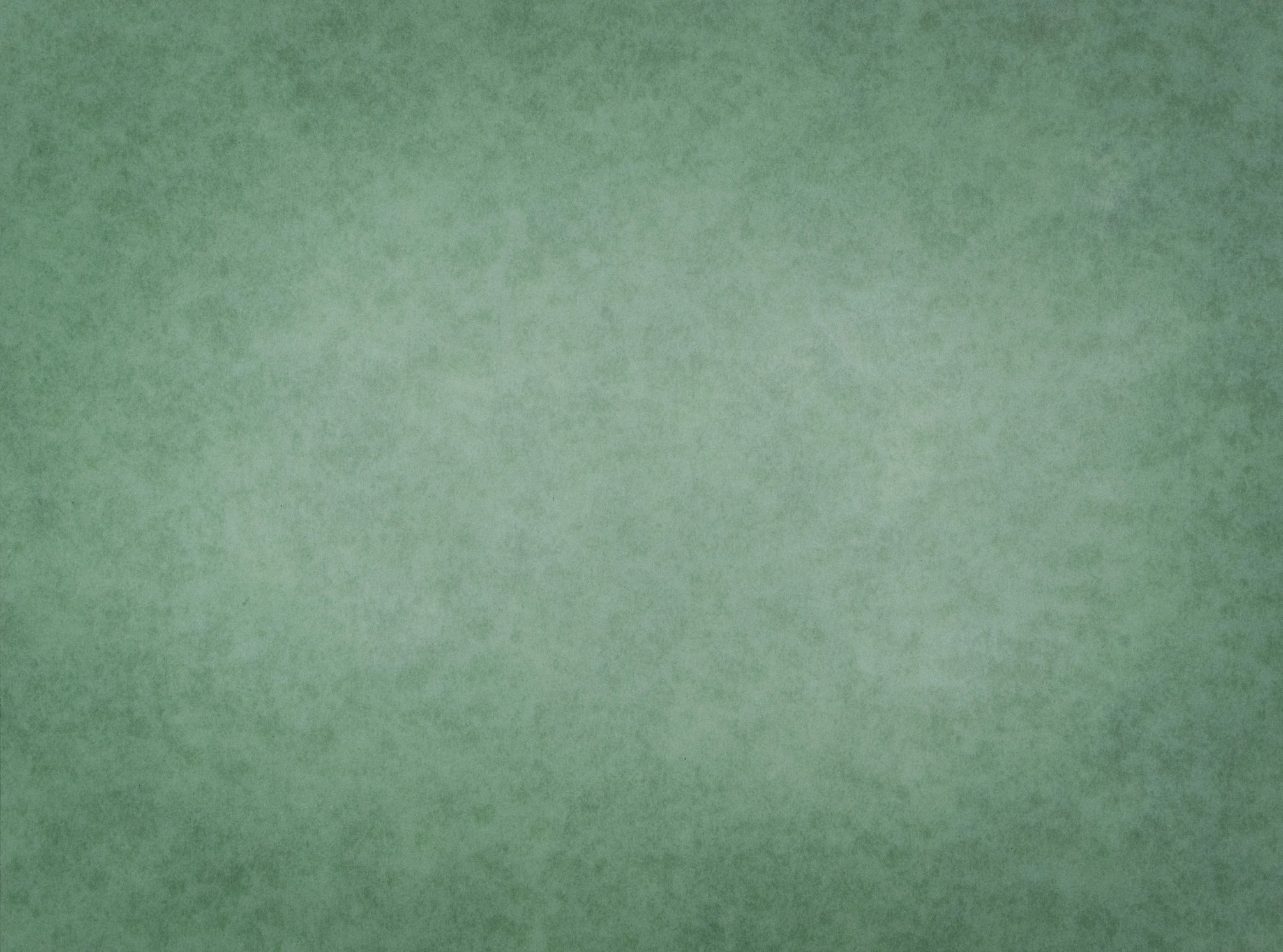 Soft green textured paper background