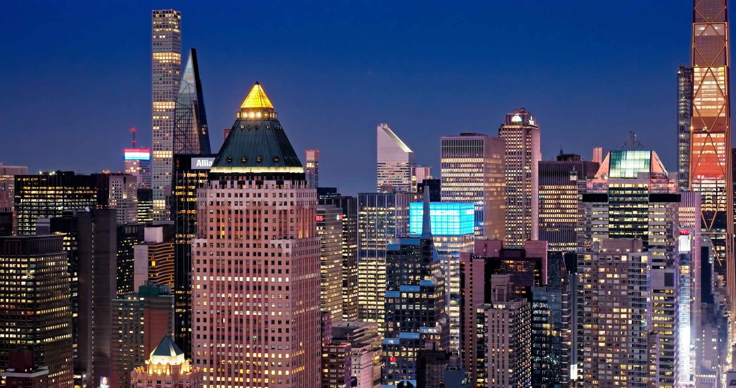 City skyline at twilight with tall buildings