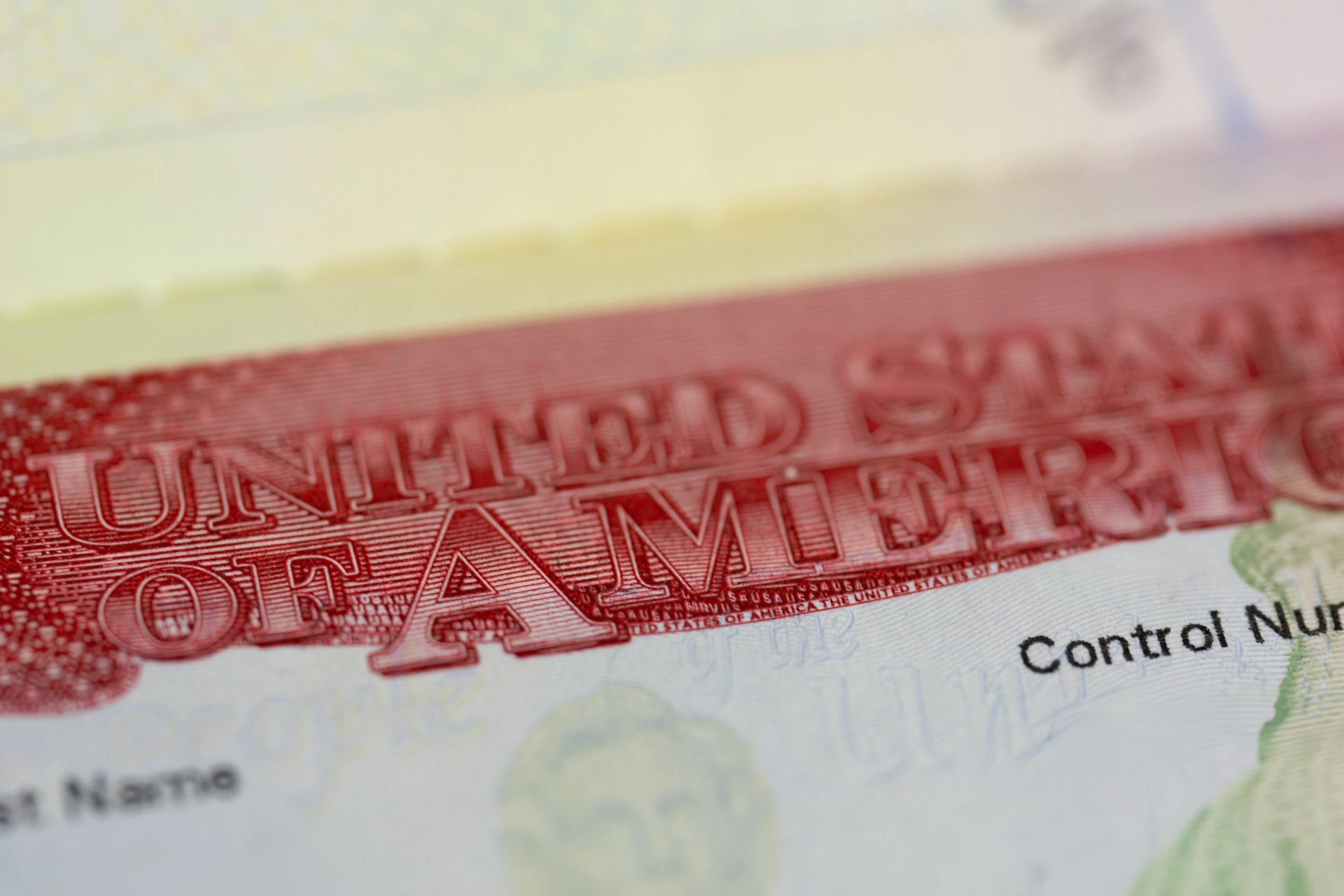 Visa stamp close-up on a passport page