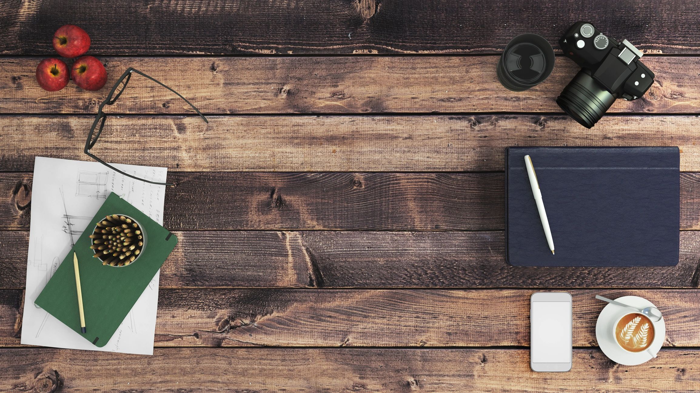 Minimal writer desk with notebook and pen